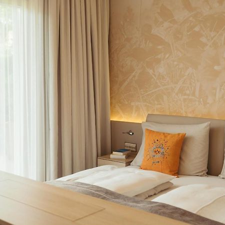 Strandhotel Am ไวส์เซินซี ภายนอก รูปภาพ